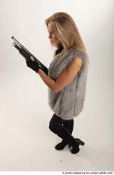 NIKOL STANDING POSE WITH SHOTGUN